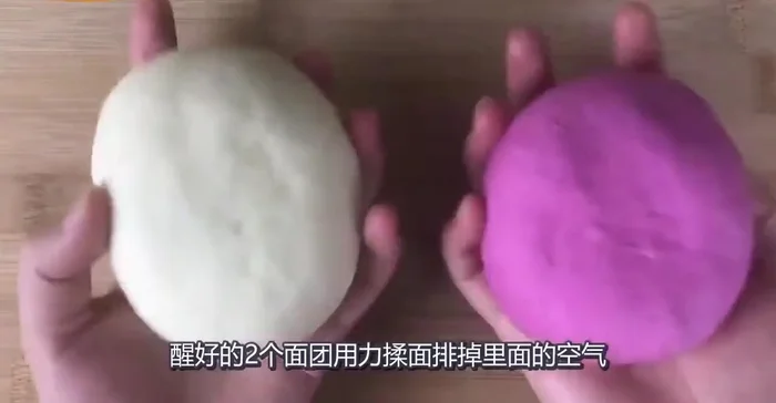 Punch down the dough and divide it into equal portions.