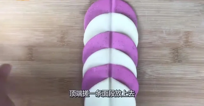 Roll out each portion into a long strip.