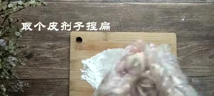 Arrange the mooncakes on a baking sheet. (Note: The transcript doesn't specify baking, but steaming is common.)