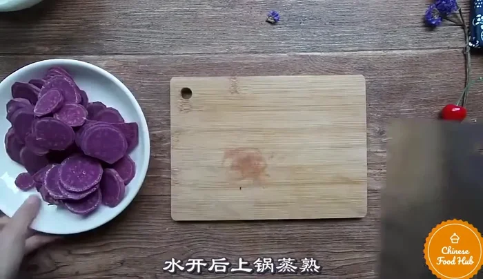 Shape the mooncakes using a mooncake mold. (Process not detailed in transcript)