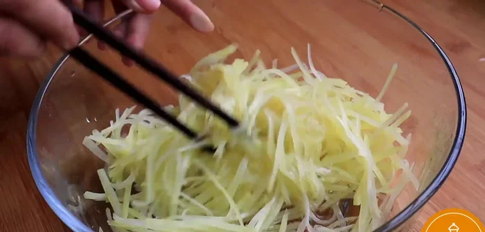 Form the potato mixture into small pancakes and fry them until golden brown and crispy.