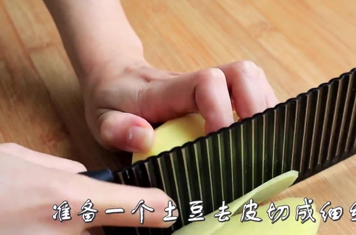 Prepare the potatoes and onion by grating them.