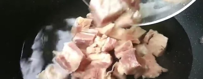 Prepare the beef brisket by cleaning and cutting it into appropriate pieces.