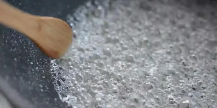 Cool and set: Let the sugar coating harden completely on a wire rack or parchment paper.