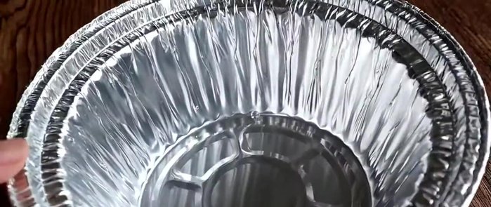 Serve immediately in bowls. For an authentic presentation, you could use aluminum foil as shown in the original video.