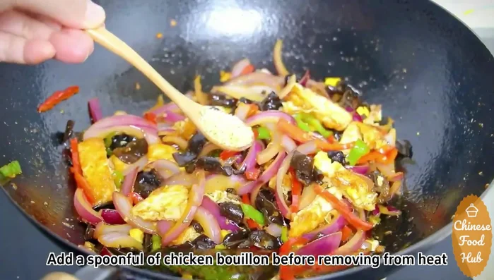 Add chicken bouillon and a few drops of sesame oil before removing from heat.