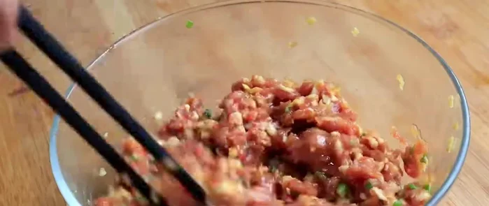 Heat oil in a frying pan.
