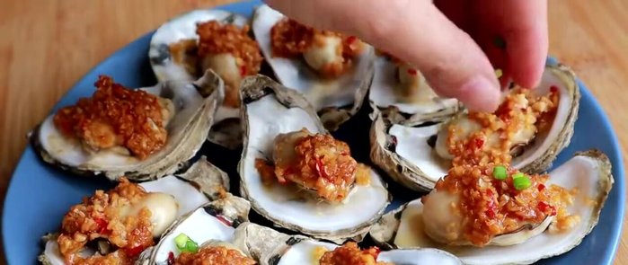 Remove the oysters from the grill and let them cool slightly.