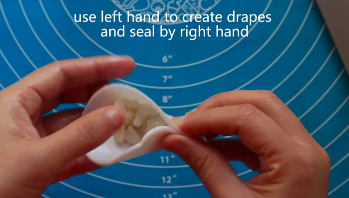 Fill each wonton wrapper with the shrimp and pork mixture.