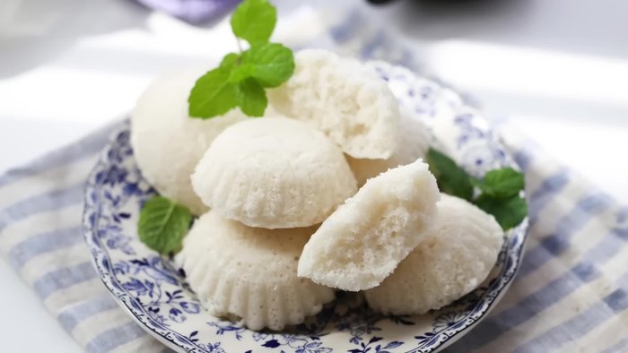 Combine rice flour, sugar, baking powder, and yeast in a mixing bowl. (Note: Specific ingredient quantities are not provided in the audio transcript)