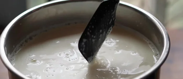 Heat the soy milk to a boil, stirring frequently to prevent burning.