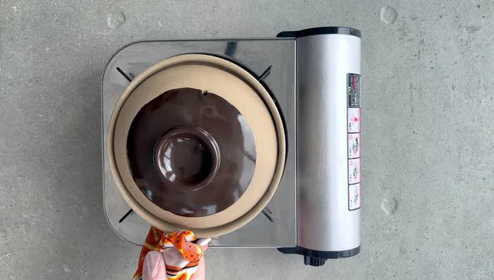 Cover the clay pot and cook over low heat until the rice is cooked through. This may take 30-40 minutes, depending on your stove and the type of clay pot.