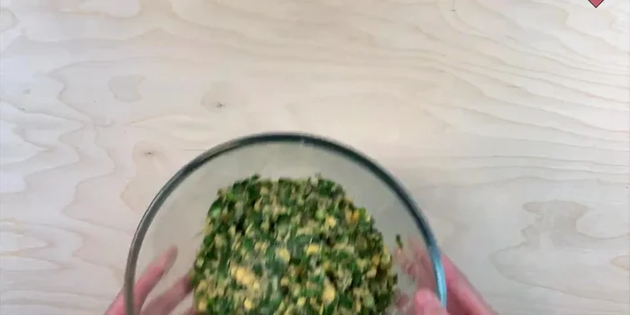 Cook the dumplings in boiling water until they float to the surface, then cook for a few more minutes. (Implied by music and audio)