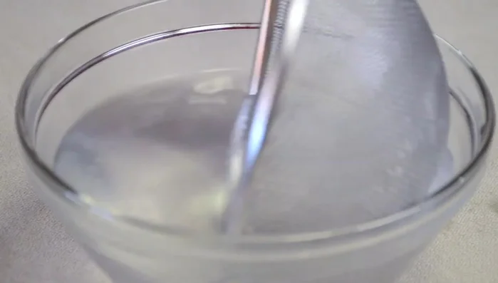 Peel and segment the pomelo, removing any membrane.