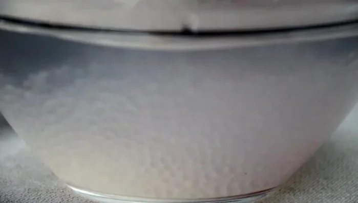 Make a simple syrup by combining sugar and water, then simmer until sugar dissolves. Let cool.