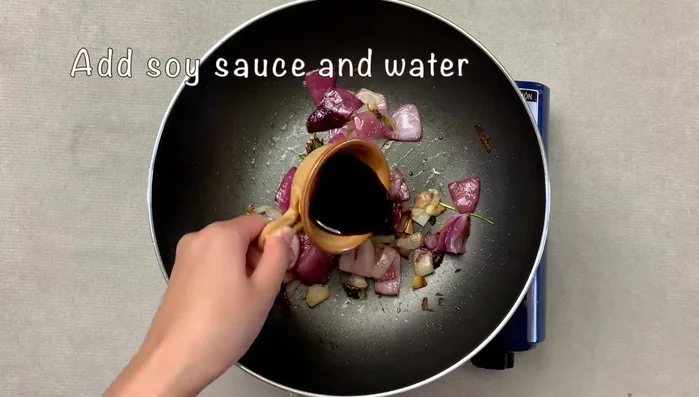 Pour the sauce: Once the fish is cooked, pour the sauce over it.