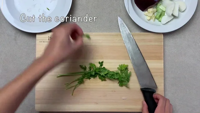 Season the fish: Place ginger and scallions inside the fish cavity. Season with salt.