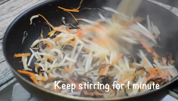 Prepare the rice paper wrappers: Soak each wrapper in warm water for a few seconds until softened.