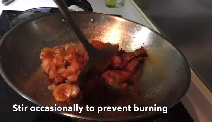 Sear the pork belly until golden brown. (Detailed instructions would be added here based on the video content)