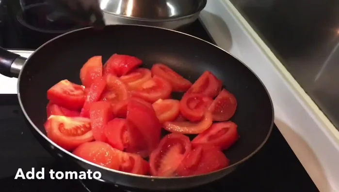 Add tomatoes and stir-fry until slightly softened.