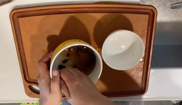 Dish is likely complete, applause suggests the end of the cooking process