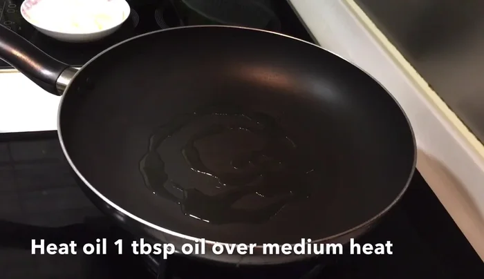Season with soy sauce, oyster sauce, and pepper to taste.