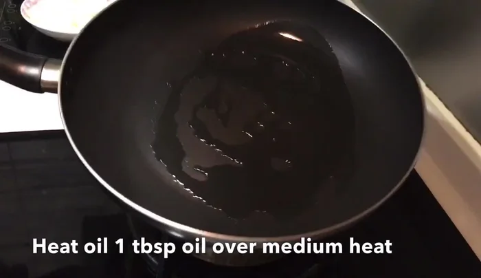 Stir-fry everything together for about a minute to combine flavors and ensure everything is cooked through.