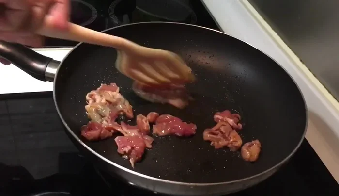 Serve immediately with rice or noodles.