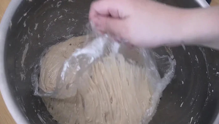 Once the dough has risen (sticky honeycomb structure), flour your board, and knead the dough until smooth and not sticky (about 10 minutes).