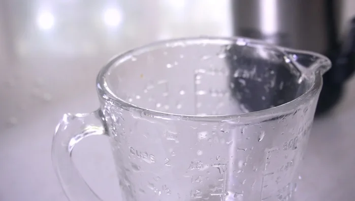 In a separate bowl, pour warm water (as hot as possible before boiling).