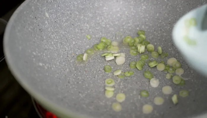 Stir-fry the egg whites until set and set aside.