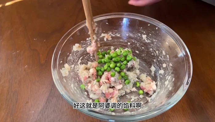 Add green peas to the mixture.