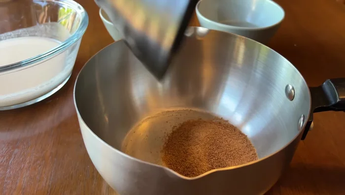 Red Layer: In a separate pot, combine the remaining two parts of water with coconut sugar. Bring to a rolling boil while stirring until dissolved. Immediately remove from heat and add the starch mixture, stirring continuously until slightly thickened.