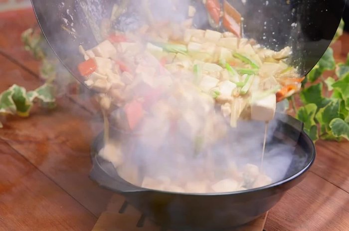 Music starts, possibly indicating a transition to visual demonstration of ingredient preparation.