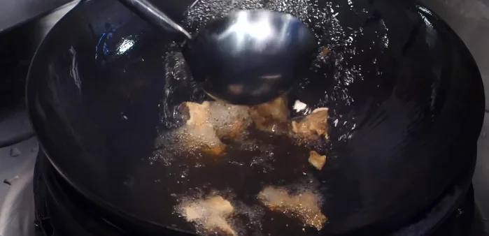 Continuing cooking process.