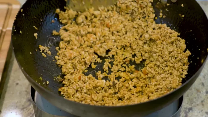 Add cooking wine, soy sauce, oyster sauce, and dark soy sauce. Season.