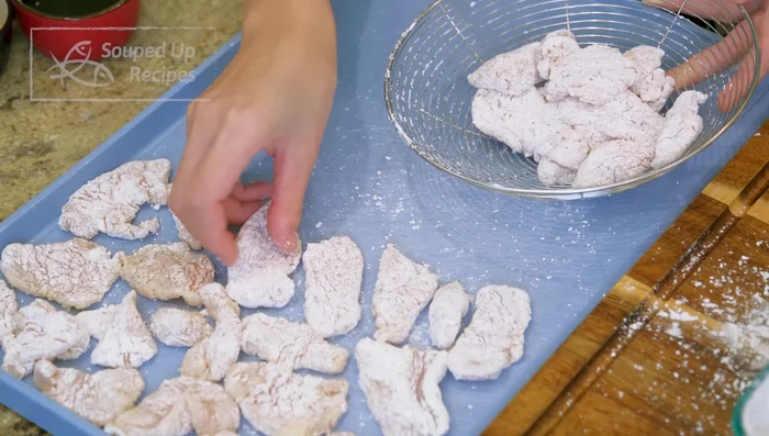 Let coated chicken rest for 15 minutes.
