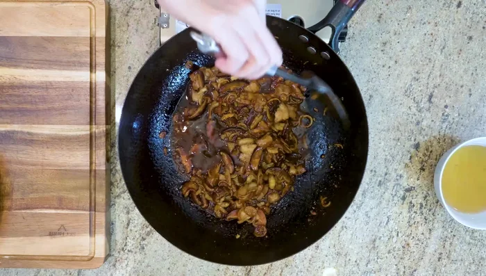 Pour in half of the mushroom soaking liquid (reserve the rest for adjusting consistency).