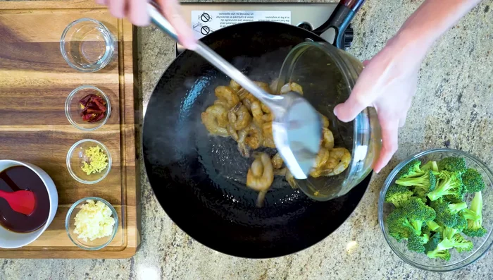 Stir-fry shrimp for a couple of minutes until pink (slightly translucent inside). Remove and set aside.