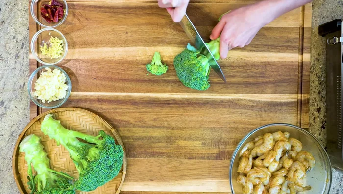 Cut broccoli into florets. (Tip: Peel and quarter broccoli stems for pickling!)