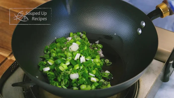 Rinse diced garlic under running water to remove macans, a chemical that causes bitterness after frying.