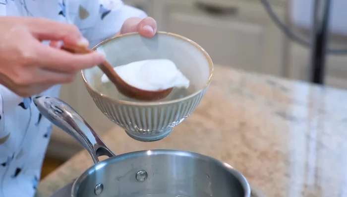 Remove poached eggs from water to avoid overcooking.