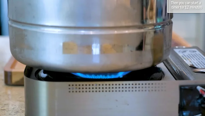 Steam buns for 12 minutes, then let them rest in the steamer for 10 minutes before opening the lid.