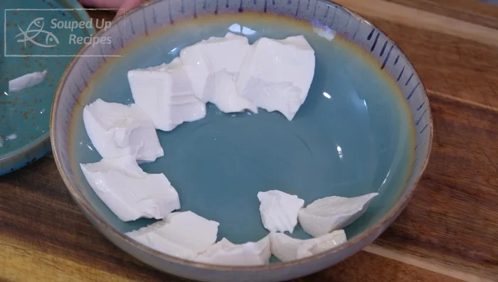 Scoop tofu onto a plate to create more surface area.