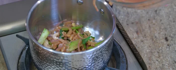 Make the gravy: Sauté the aromatics from the marinade (excluding the liquid) until caramelized. Add the leftover marinade and 1/4 cup of water. Simmer and strain.