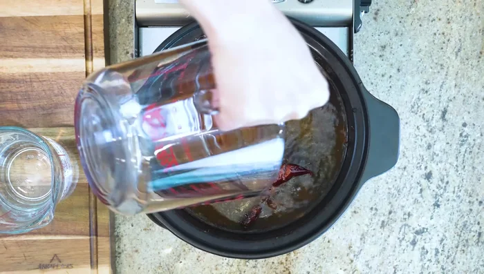 Add water and simmer: Add warm water to cover the beef. Bring to a boil, then taste and adjust with soy sauce (I used 4 tablespoons plus dark soy sauce for color). Reduce heat to low and simmer for 2 hours, or until tender.