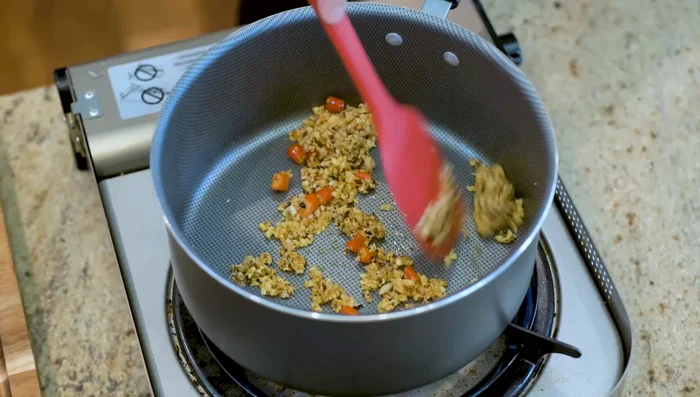 Add soy sauce, Chinese black vinegar, fish sauce, and salt. Stir until fragrant.