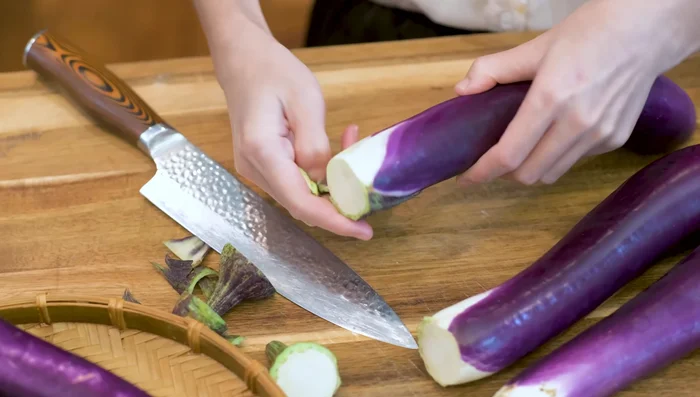 Remove the stem from the eggplants.