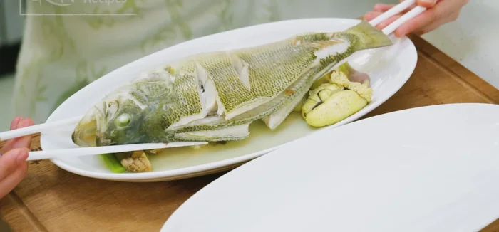 Check doneness with a chopstick. Transfer the fish to a clean plate.
