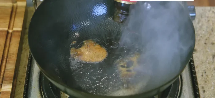 Add 2 tbsp oyster sauce and 1 tsp dark soy sauce.